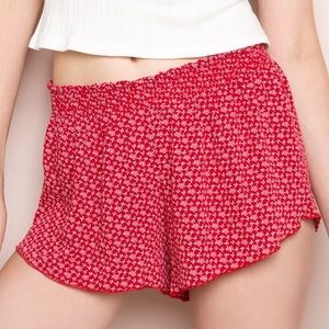 Red flowy floral shorts